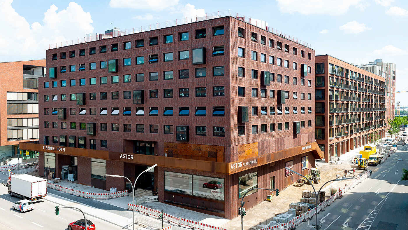 Das Quartier KPTN beherbergt rund 150 Wohnungen, Einzelhandel, Gastronomie, ein Hotel sowie ein Kino. Foto: Schöck Bauteile GmbH.